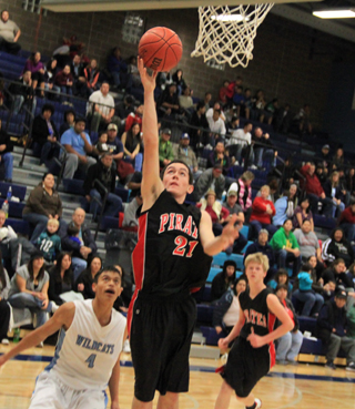 Seth Chaffee got inside the defense for a lay-up. In the background is Rhett Schlader.