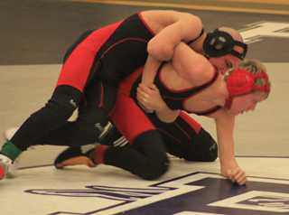 In an all-Prairie final at 120 lbs. Hunter McWilliams gets the takedown on Dally Ratcliff and eventually won by pin.
