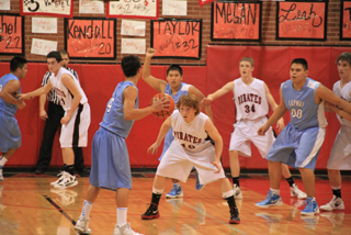 The Pirates play defense against Lapwai. From left are Seth Chaffee, Troy Lorentz, Lucas Arnzen and Justin Schmidt.