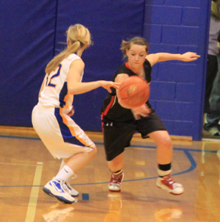Megan Sigler knocks the ball loose from Nezperces Arika Arnzen and turned the steal into 2 points on the other end.