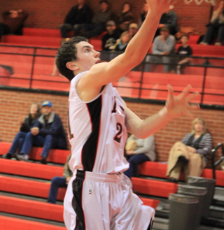 Seth Chaffee goes for a lay-up after a Timberline turnover