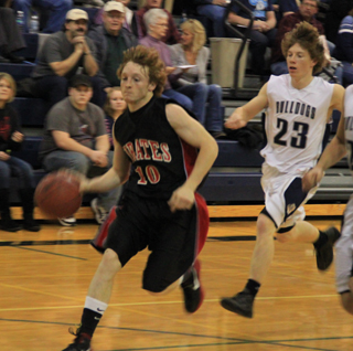 Troy Lorentz heads downcourt after making a steal in the Grangeville game.