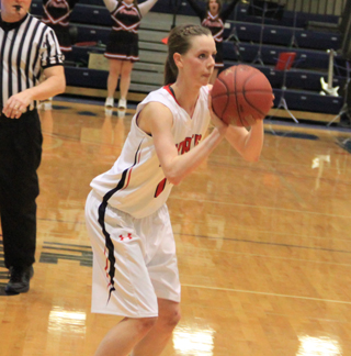 MaKayla Schaeffer sites in a 3-point shot in the first half against Troy at District.