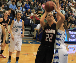MeShel Rad gets inside the defender on this lay-up attempt. At left is Makayla Schaeffer.