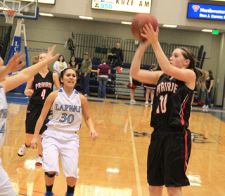 Megan Sigler got some open looks on 3-point attempts against Lapwai and knocked down 4 of them in the game. In the background is Tanna Schlader.