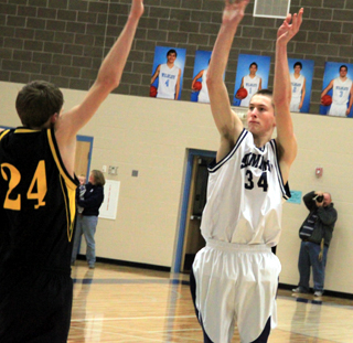Austin Chmelik shoots against Highland at District.