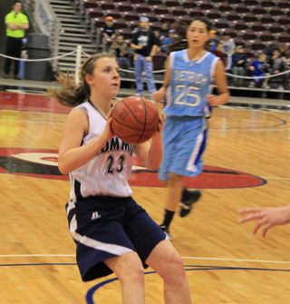 Brooke Schumacher puts on the brakes and is about to shoot a short jumper for 2 points against Dietrich.