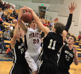 Justin Schmidt gets hammered as he goes for a lay-up against Deary.