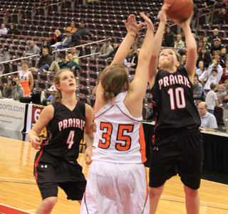 Megan Sigler scores a transition lay-up in the championship game. At left is Tanna Schlader.