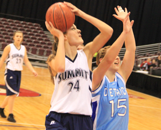 Savanah Prigge puts up a shot against Dietrich in the championship game. In the background is Brooke Schumacher.