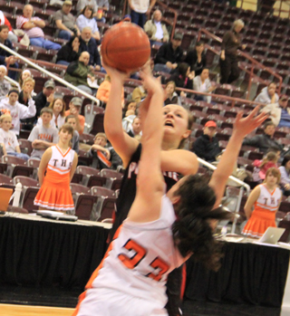 Taylor Heitman scored 2 of her 9 second quarter points that helped Prairie take a halftime lead against Troy. She added the and-1 as she got fouled.