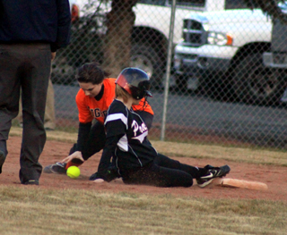Makenzie Rieman slides into second with a stolen base.
