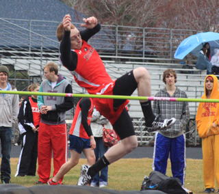 Troy Lorentz clears an early height in the high jump. He placed 6th in the event.