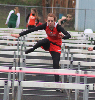 Brandi Gehring in a 100 hurdles heat.