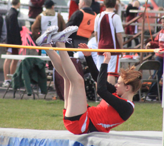 Brandi Gehring clears 4'6 in the high jump to place third at the Kamiah meet.