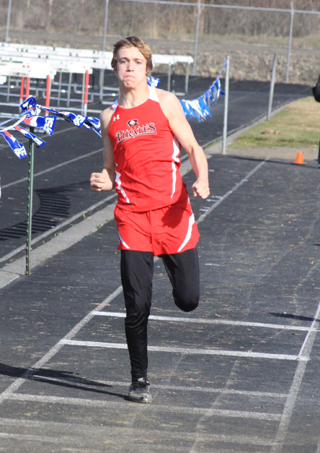 Dally Ratcliff takes off on the second stage of the triple jump at the Lapwai meet.