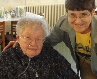 Sister Theresa Mary on her 96th birthday with Assistant Prioress Sister Bernadette Stang.