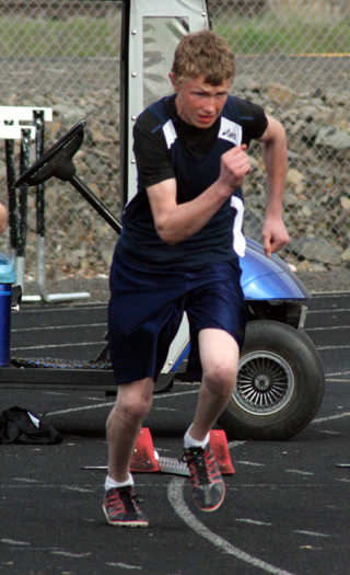 Summits Dan Wemhoff in the 100 meter dash. Photo by Steve Wherry.