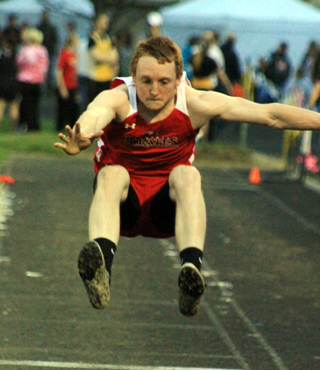 Troy Lorentz took third in his first try at the long jump.