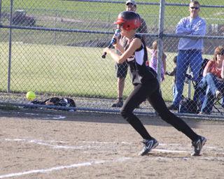 Leah Holthaus twice made it to first base on sacrifice bunt attempts against Genesee. The first time she beat it out for a hit and wound up on second. This time she reached first when the first baseman dropped the throw.