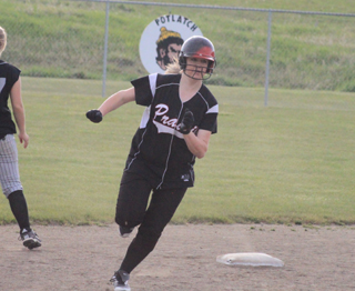 Kendall Schumacher heads for third as she knocked in the tying run with a triple in the 9th against Highland. She eventually scored the game-winning run on a hit by Taylor Nuxoll.