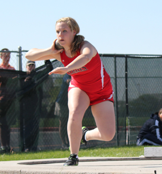 Demetria Riener in the shot put competition at State. Photo by NaTosha Schaeffer.