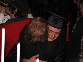 Kyle Uhlenkott gets a hug from a well-wisher.