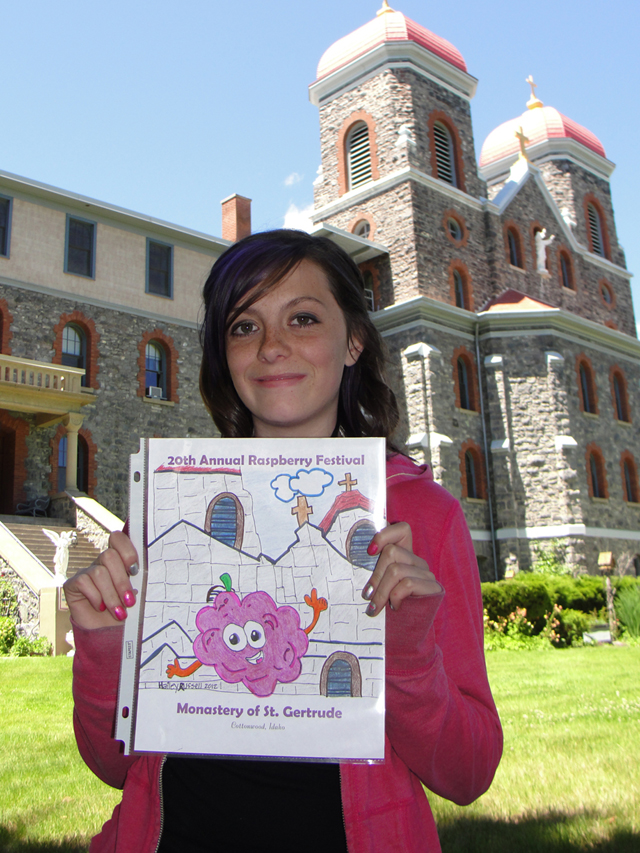 Hailey Russell, age 12, with her winning entry for the Raspberry Festival t-shirt design contest.