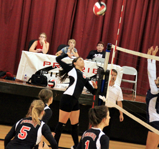 Cheryl Gehring goes for the kill in the Lapwai match. Also shown are Kelsey Tidwell, Shelby VonBargen and Leah Holthaus.