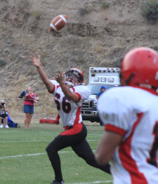 Seth Chaffee goes for the ball. At right is Tyler Hankerson.
