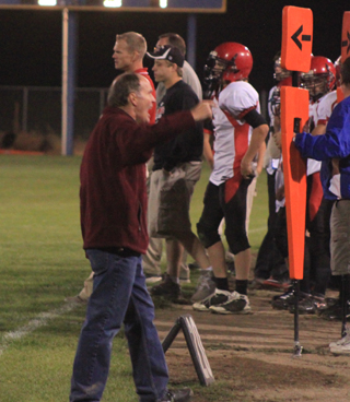 Jerry Richardson stepped into a cheerleading role in the fourth quarter leading a PRAIRIE.PIRATES cheer as the football team was trying to come from behind and tie the game.