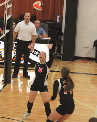 Kelsey Tidwell sets the ball for Shelby VonBargen during the Kootenai match at the Kendrick Tournament.