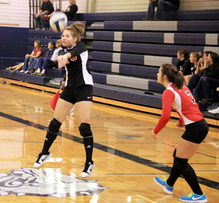 Beka Bruner makes as pass as Stephanie Gimmeson watches during the Grangeville Tournament.