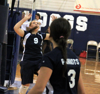 Summits Rachael Frei sets the ball for Megan Rehder during the Grangeville Tournament.