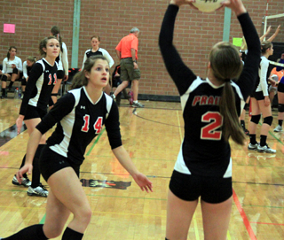 Shelby VonBargen gets ready for Hailey Danlys set in the Asotin match at Pomeroy. In the background is Krystin Uhlenkott.
