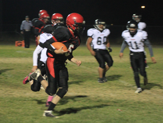 Marcus Higgins runs in a 2-point try after Prairies fourth touchdown of the game.