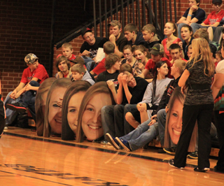 Shelley Schlader of Schlader Photography made up oversized head shots of some of the girls players that fans would wave in encouragement. She also made some for the boys team that made their way to Troy and Genesee over the weekend.