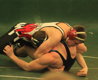Kade Perrin works toward a pin in this match.