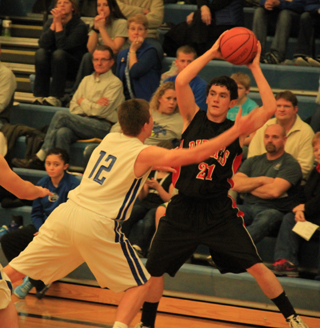 Seth Chaffee looks to make a pass in the Genesee game.