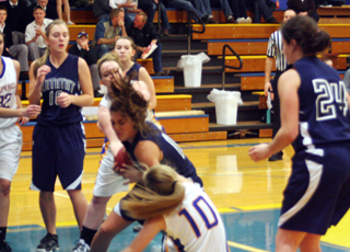 Megan Seubert battles for the ball with two Nezperce players as, from left, Sarah Chmelik, Rachael Frei and Megan Rehder look on. Photo by Steve Wherry.