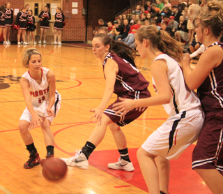 Callie Mader passes to Tanna Schlader in the Kamiah game.
