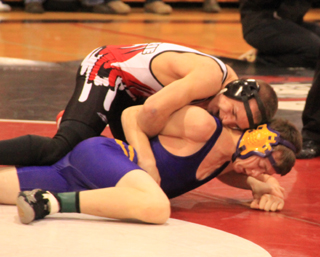 Hunter McWilliams attempts to turn a Lewiston wrestler.