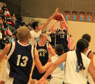 Josh Lustig managed to get this shot off against Lapwai last Friday. Also shown are Shane Stubbers, 13, and Matthew Schwartz, 42.