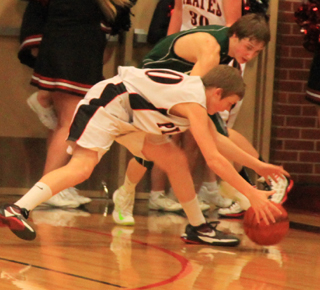 Jared Higgins makes a steal against Potlatch.
