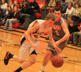 Dan Wemhoff takes the ball into the lane against Troy.