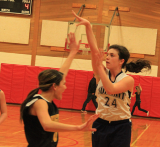 Megan Rehder puts up a jumper against Highland.