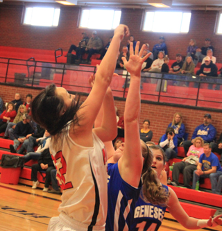 Taylor Heitman scores against Genesee.