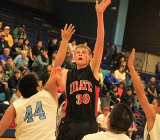 Jake Bruner puts up a shot from the lane at Lapwai.