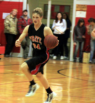 Lucas Arnzen heads downcourt after stealing the ball at C.V.