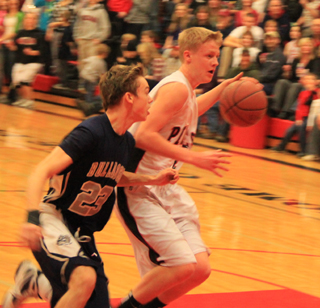 Rhett Schlader handles the ball against Grangeville.